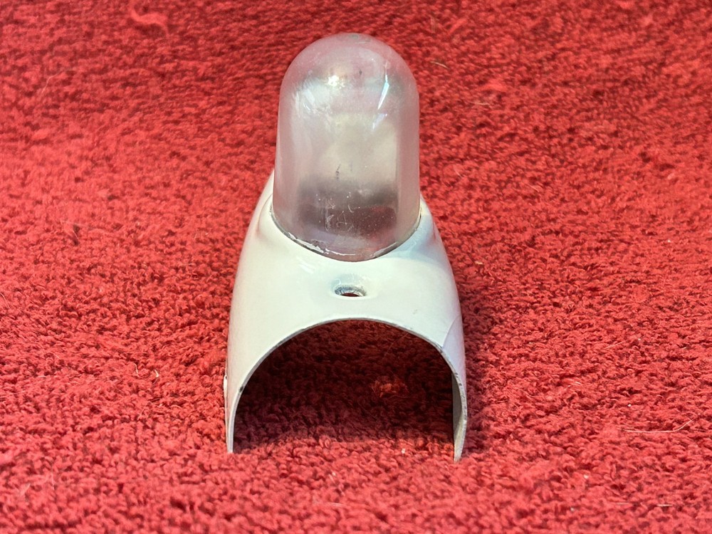 LENS AND SHIELD FOR AIRCRAFT NAVIGATION POSITION LIGHT