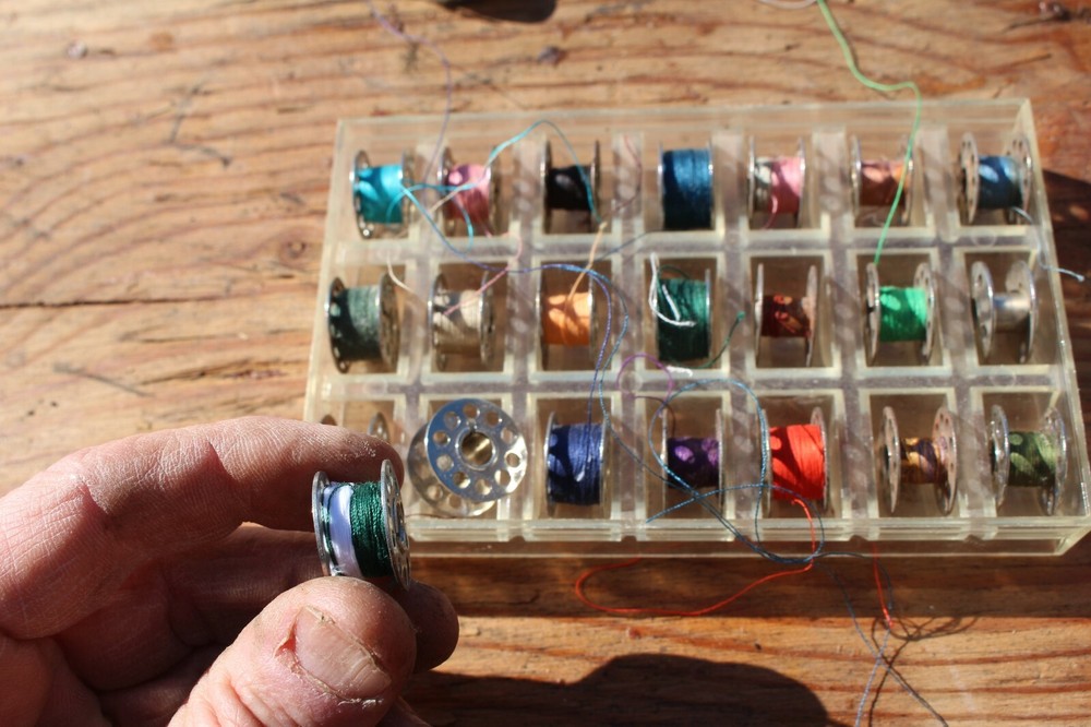 Sewing bobbins, metal, bobbin assembly, sewing machine