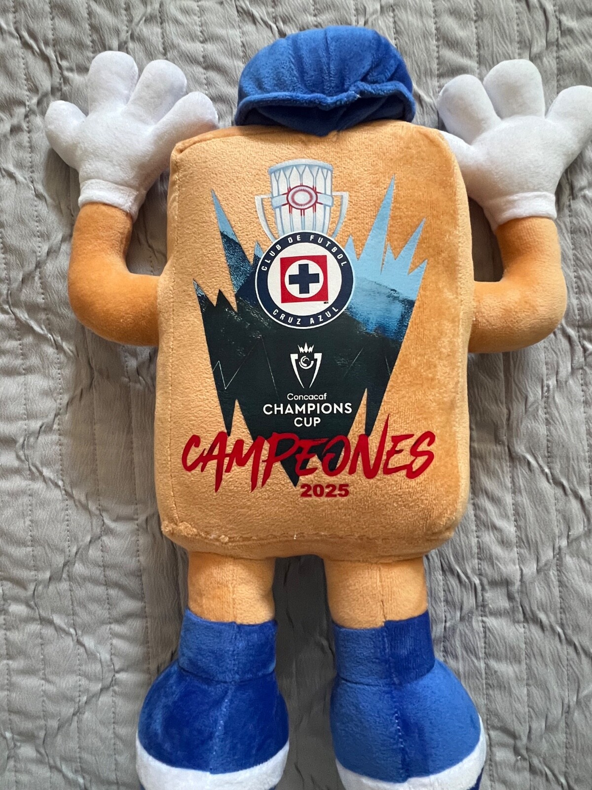 STUFFED ANIMAL “COSTALITO ” MASCOTA DEL EQUIPO CRUZ AZUL CONCACAF CAMPEÓN 2025