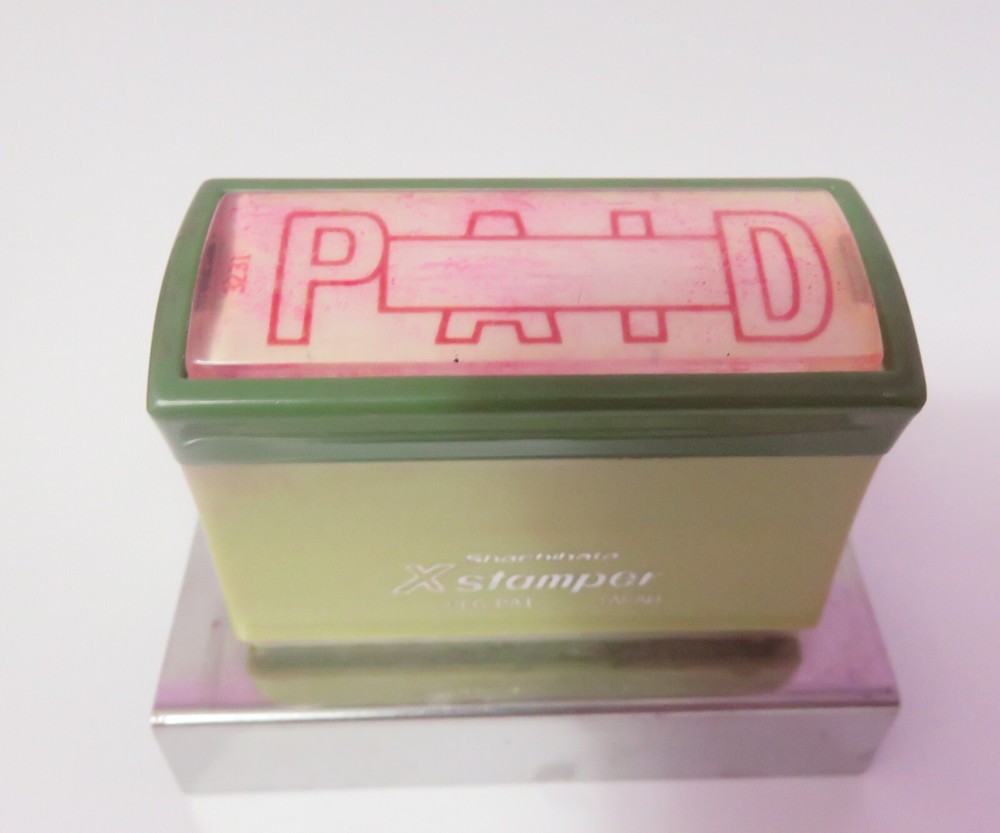VINTAGE XSTAMPER POSTAL STAMPER PAID