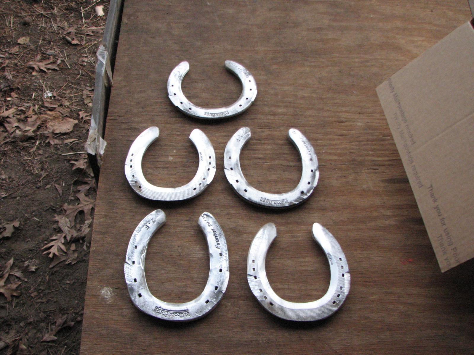 125 used aluminum horseshoes