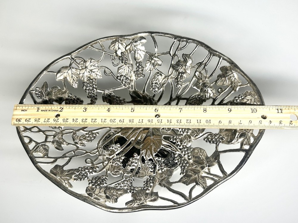 Silver-plated footed centerpiece with intricate grape and vine design