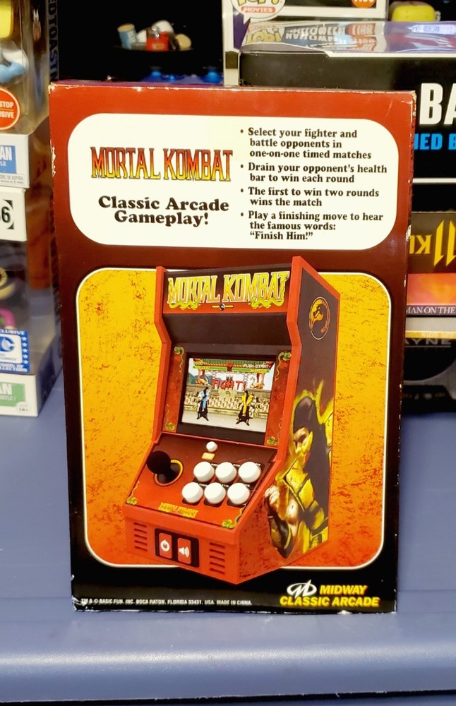 Mortal Kombat Mini Arcade [box is slightly damaged]