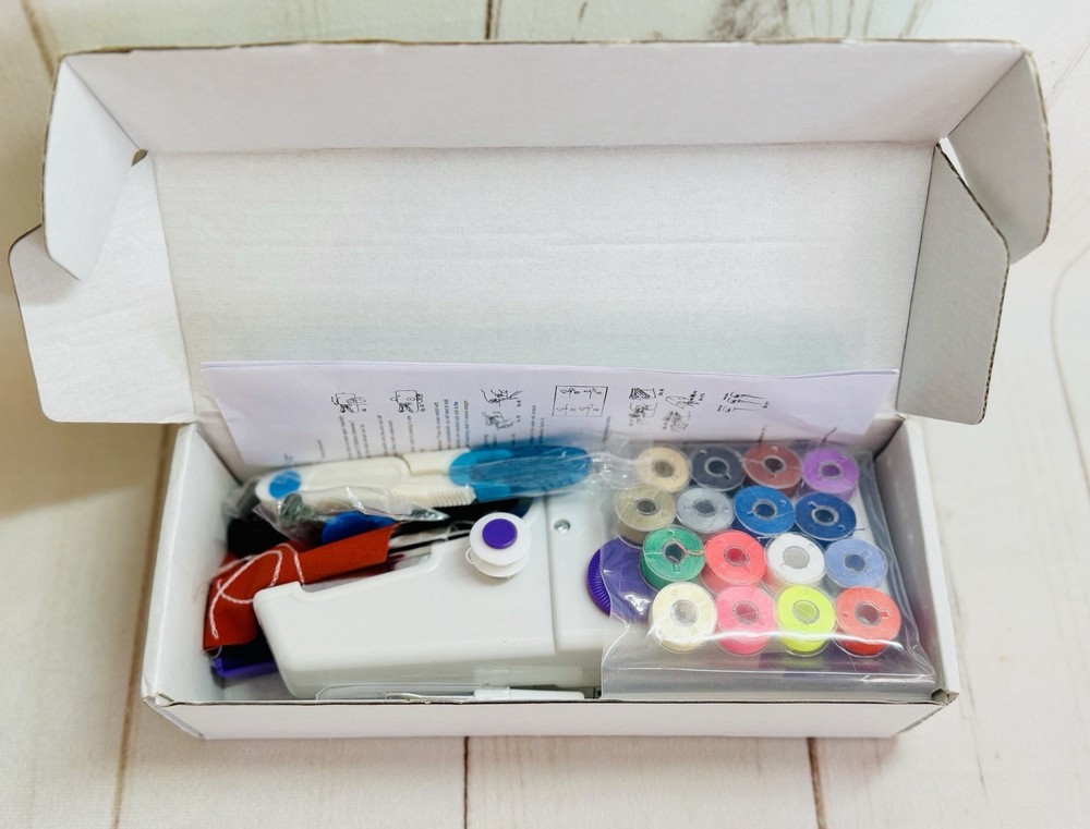 NIB Handheld Sewing Machine, Mini Sewing Machine Quick Stitching White/Purple