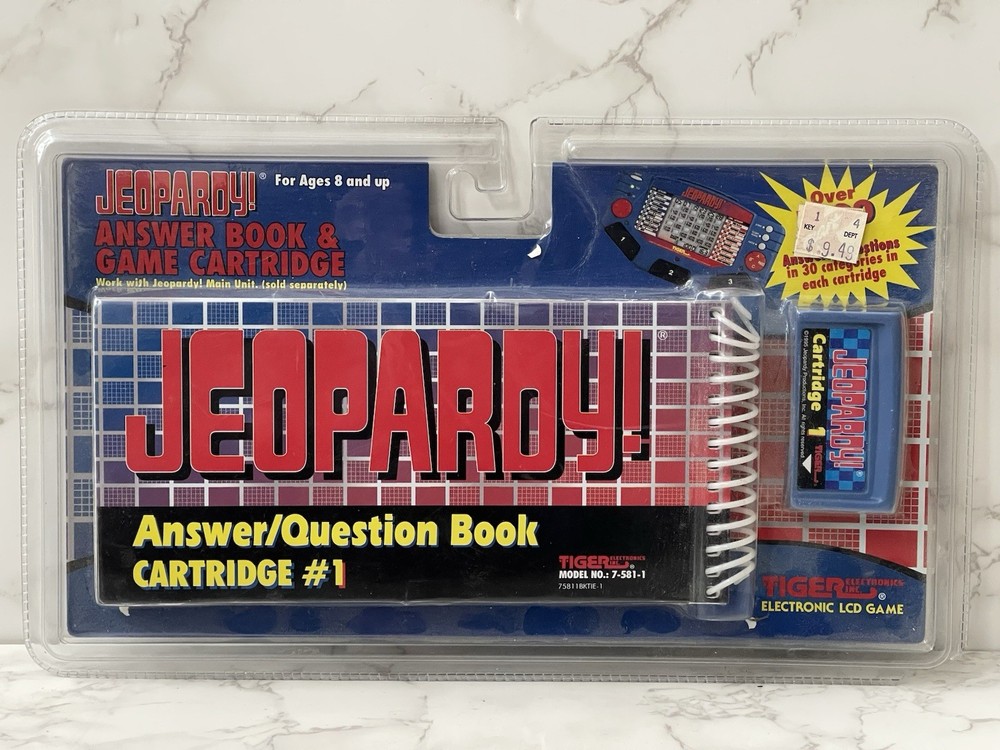 Tiger Electronics Jeopardy Handheld Game w/ 2 Answer & Question Book & Cartridge