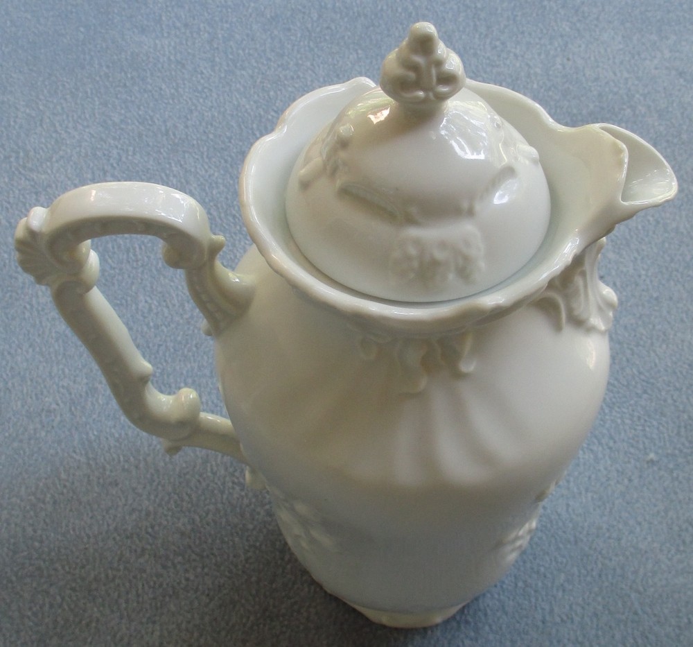 Beautiful White Porcelain Fancy Scroll Coffee Server