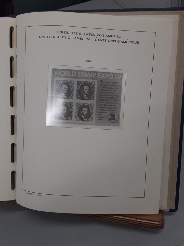 1986-1989 US Hingeless Schaubek pages in Lighthouse spring back cover no stamps