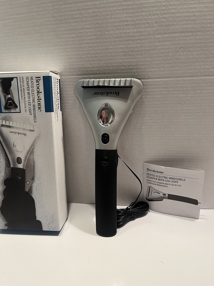 Brookstone heated electric windshield scraper with Led light Used