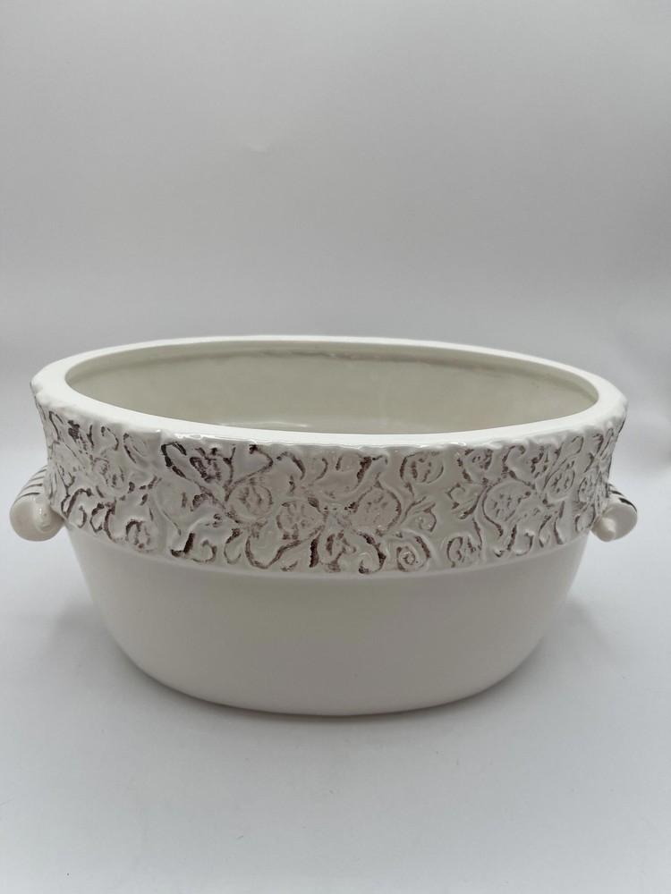Ivory pottery planter with distressed rim
