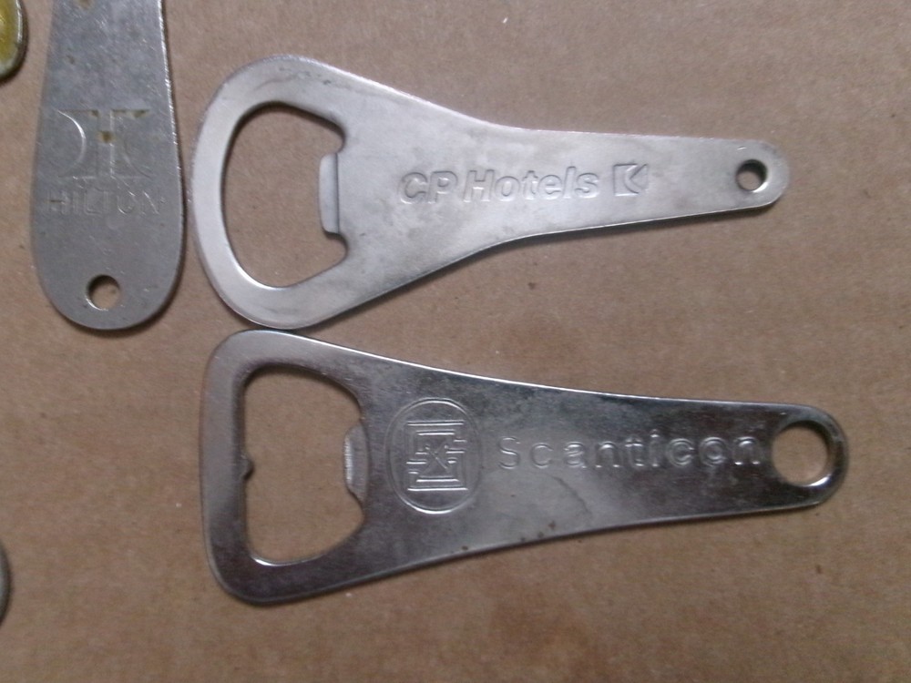 Six Different Hotel Metal Bottle Openers