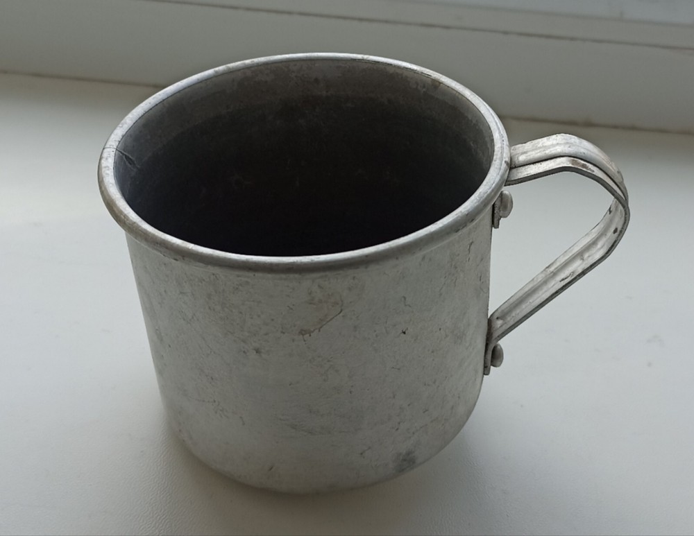 Military mug. With inscriptions.