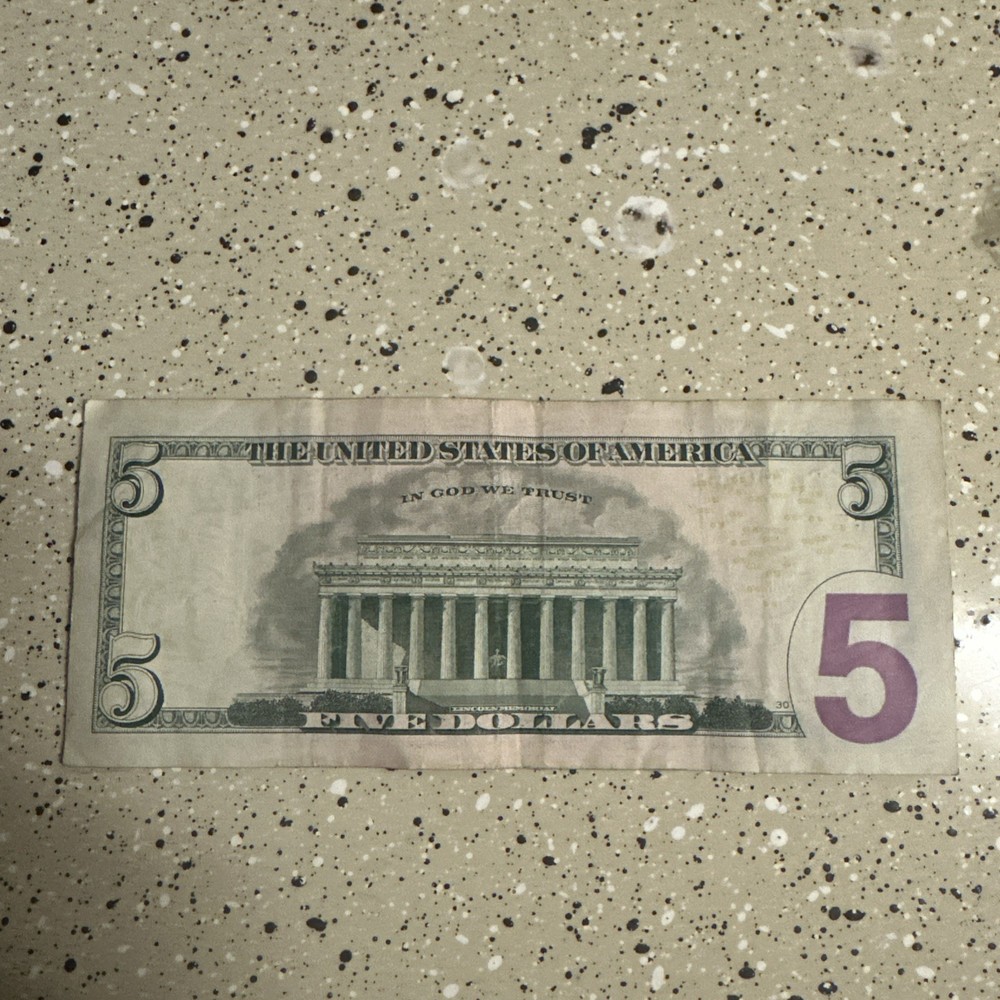 Misaligned, miscut $5 bill RARE
