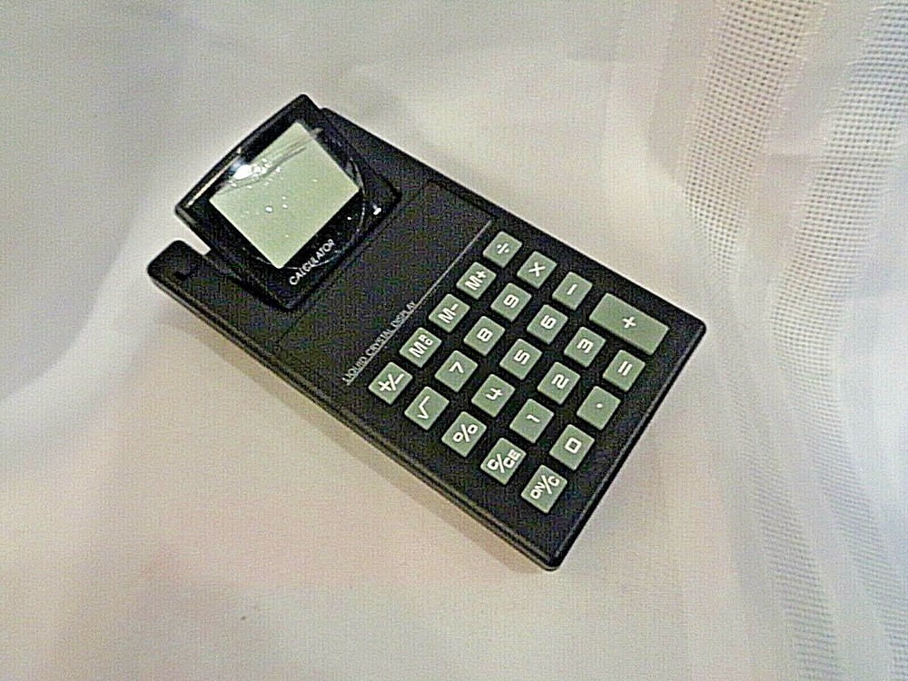 NOS TI ELECTRONIC CALCULATOR Liquid Crystal Display Adjustable Screen Black