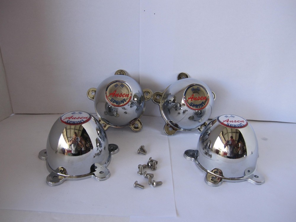 4 5  EAR PLASTIC CAPS  5  LUG ANSEN SPRINT WHEELS W/ 2 1/8 HOLE MOUNTING SPACE