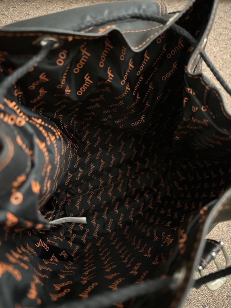 vintage-style black leather backpack