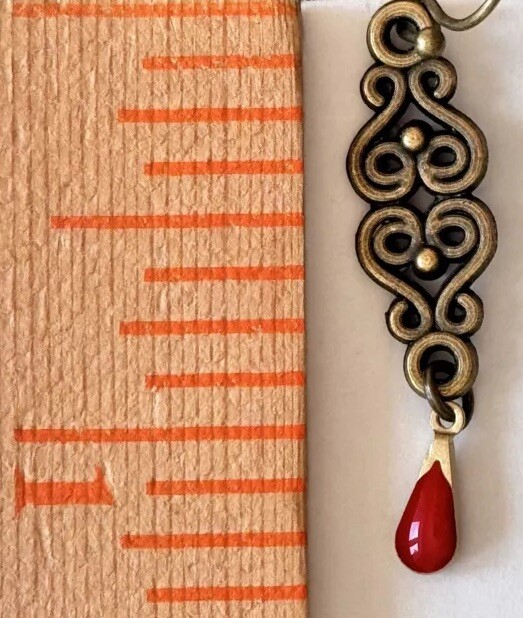Etched Bronze Design with Red Teardrop Dangle Earrings.