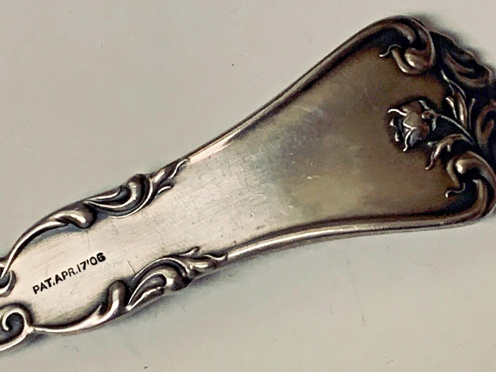 LARGE SILVER PLATE 8 1/2 INCHE FORK