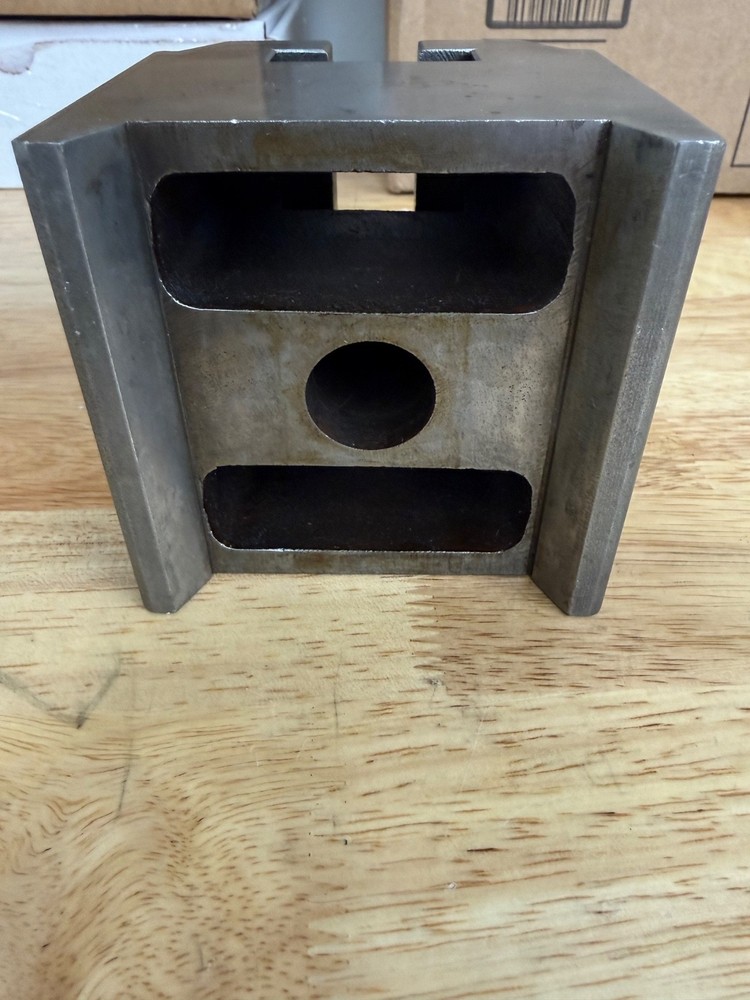 Slotted steel riser block
