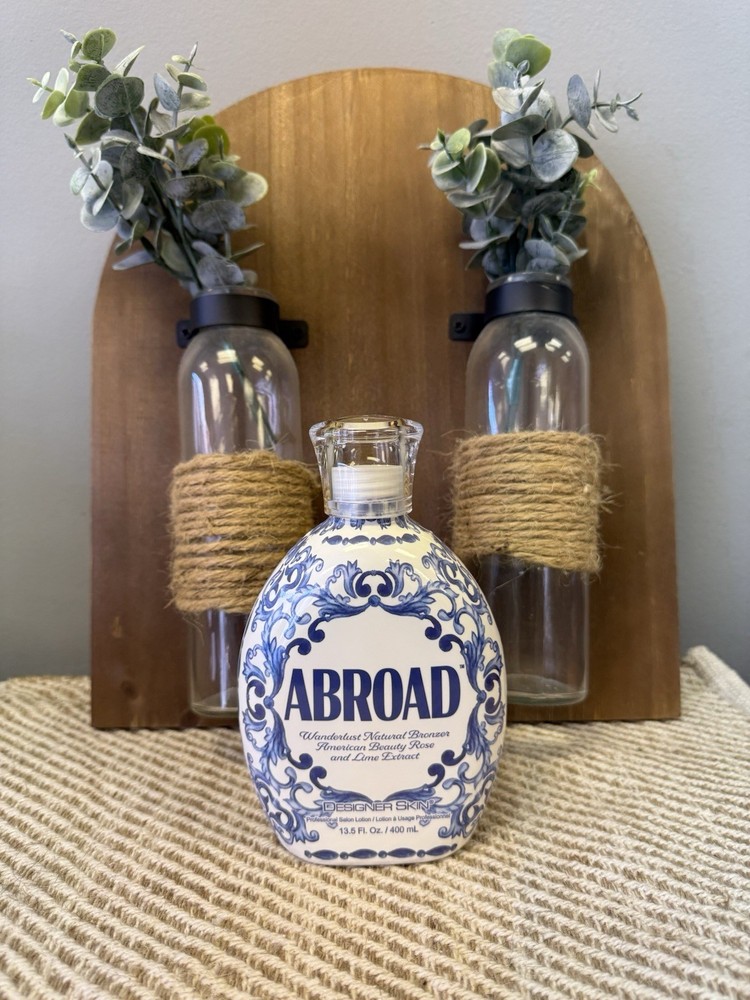 Designer Skin Abroad * FREE SAMPLE WITH PURCHASE *
