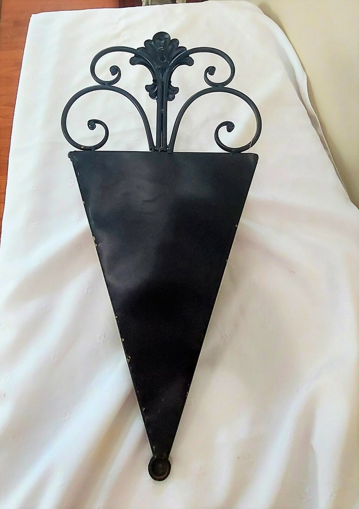 Large scroll work metal wall scone