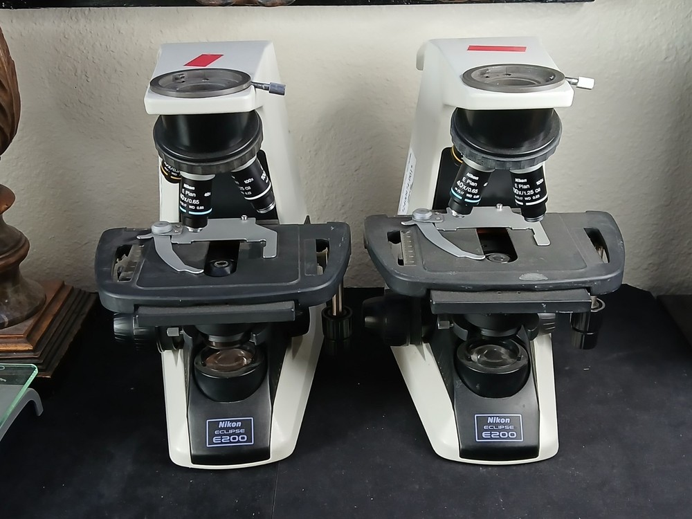(2) Nikon Eclipse E200 Microscopes & E Plan 4 10 40 100X Oil Sets (No Heads)