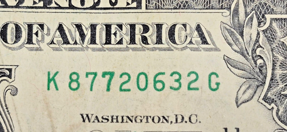 2013 One Dollar Note Over Inked Serial Number, "7"