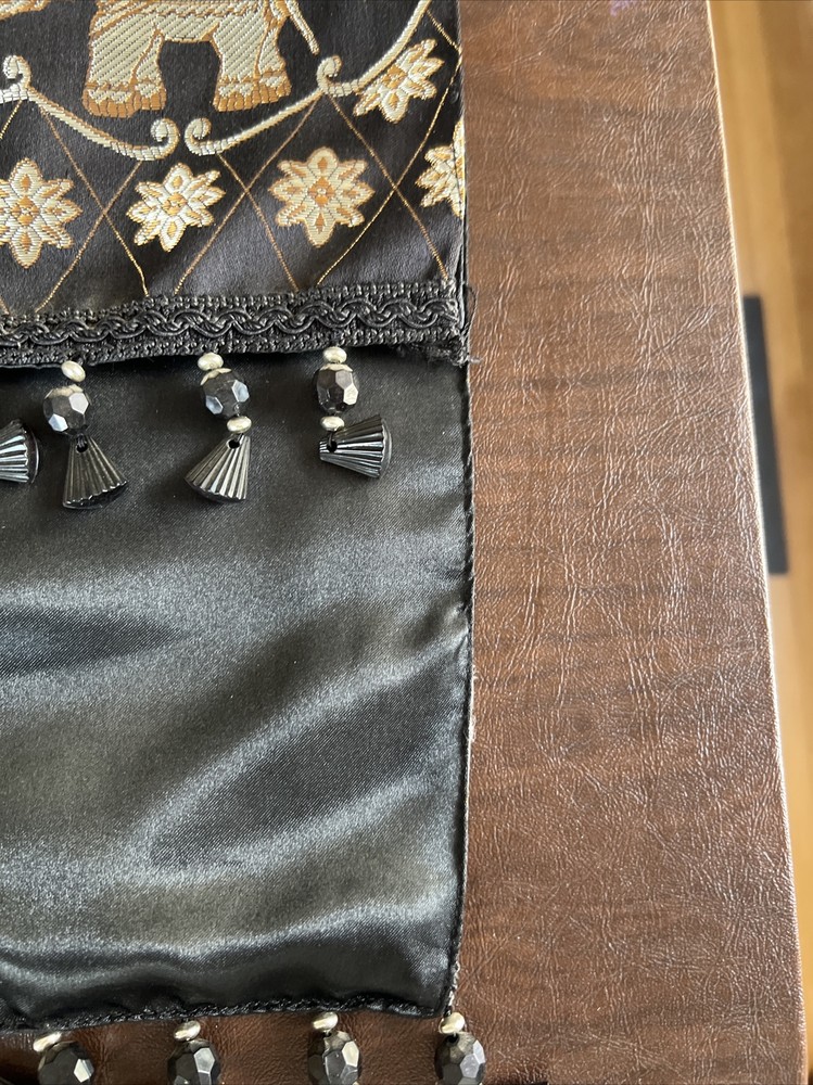 Table Runner With Gold Elephants On Black Backdrop