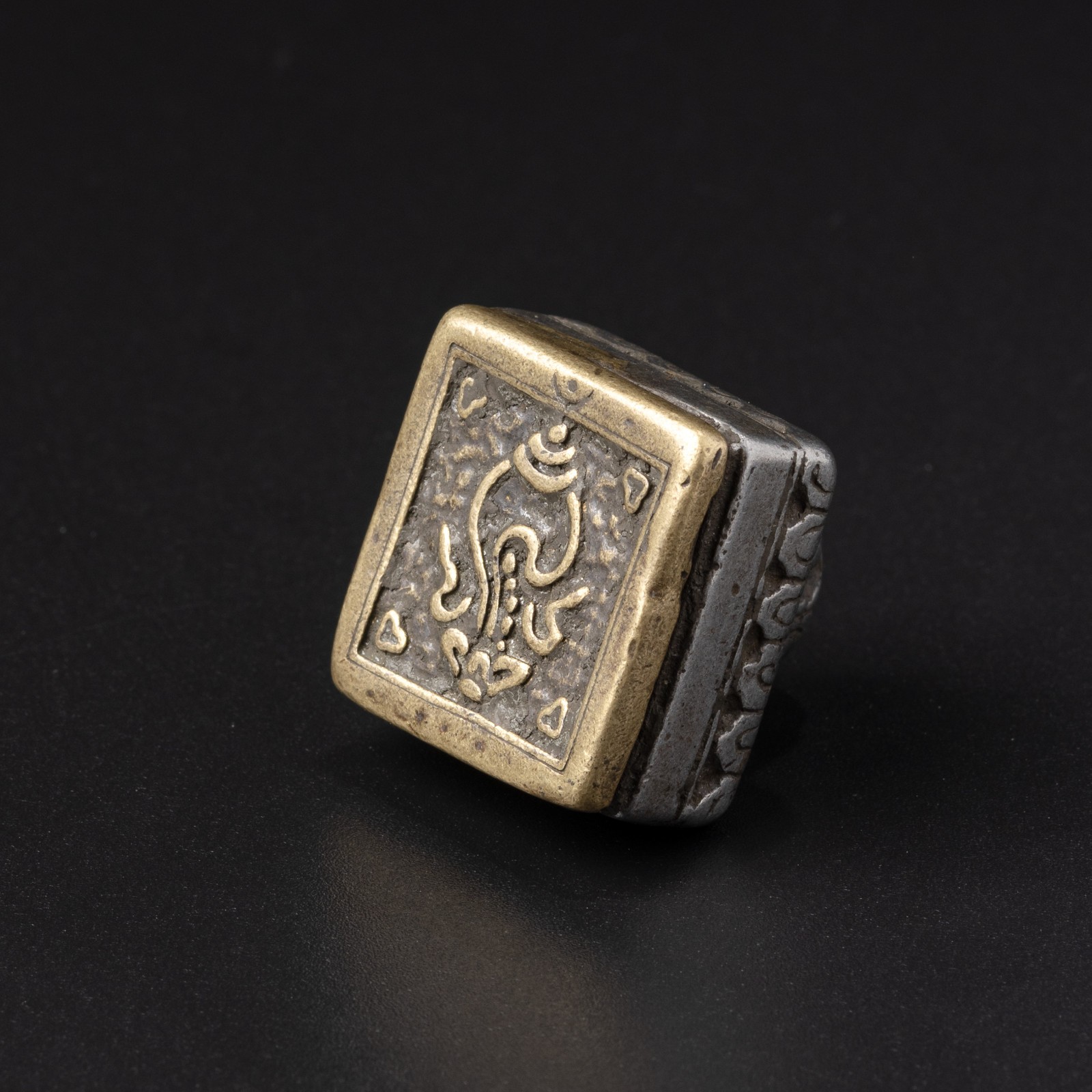 Tibetan Bronze and Iron Seal with Conch Motif
