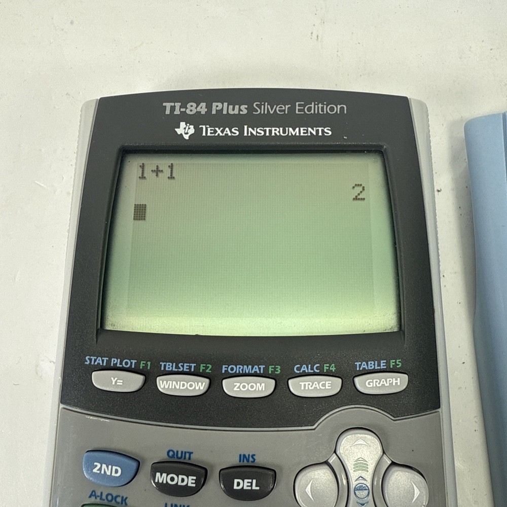 Texas Instruments TI-84 Plus Silver Edition Graphing Calculator + Cover | TESTED