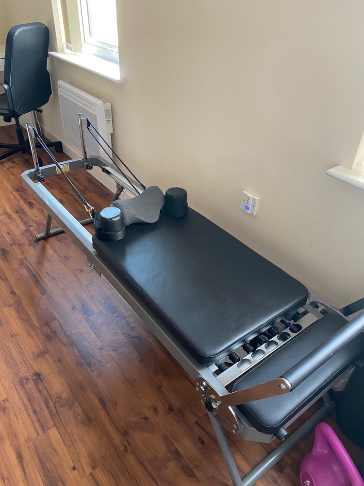 Pilates reformer machine