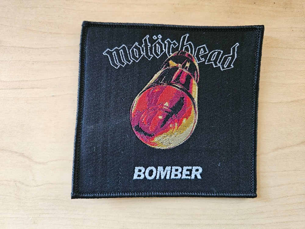 MOTORHEAD, BOMBER, SEW ON WOVEN PATCH BLACK BORDER