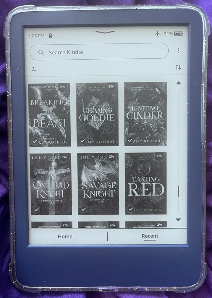 Amazon Kindle ereader Blue with books
