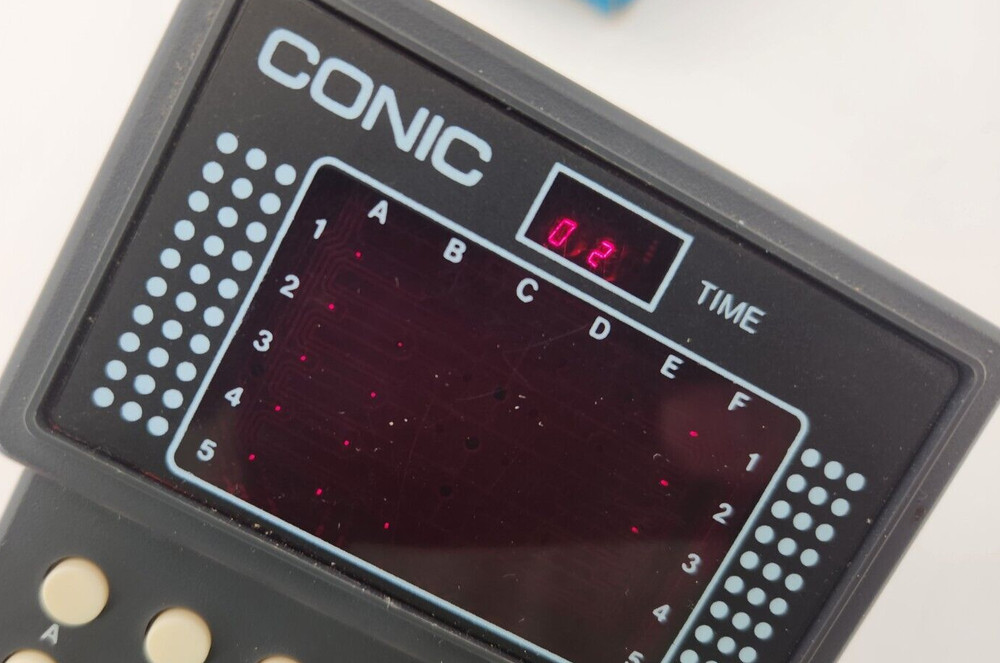 Conic hand held electronic IQ game model 003501 Tested With Box