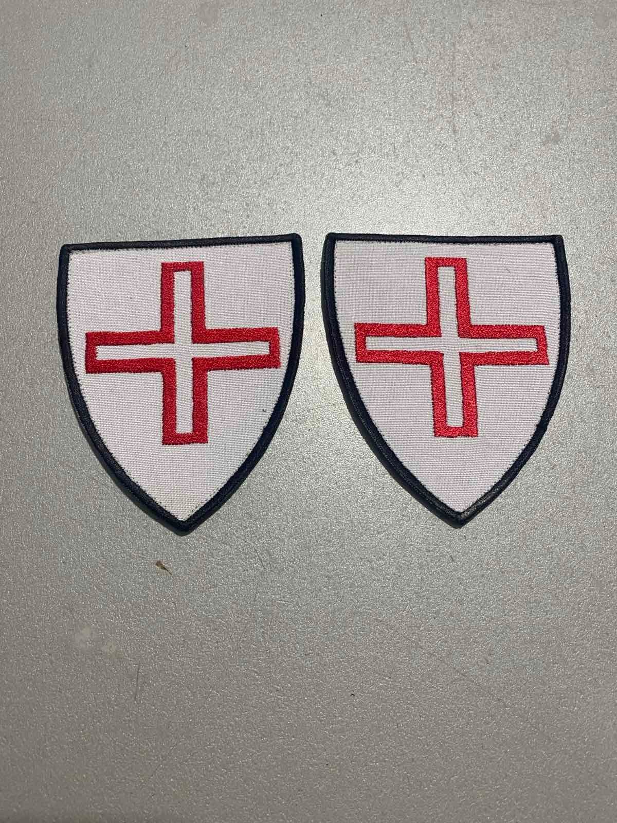 Chevron with the symbol of the Hospitallers of St. Thomas of Canterbury in Acre.