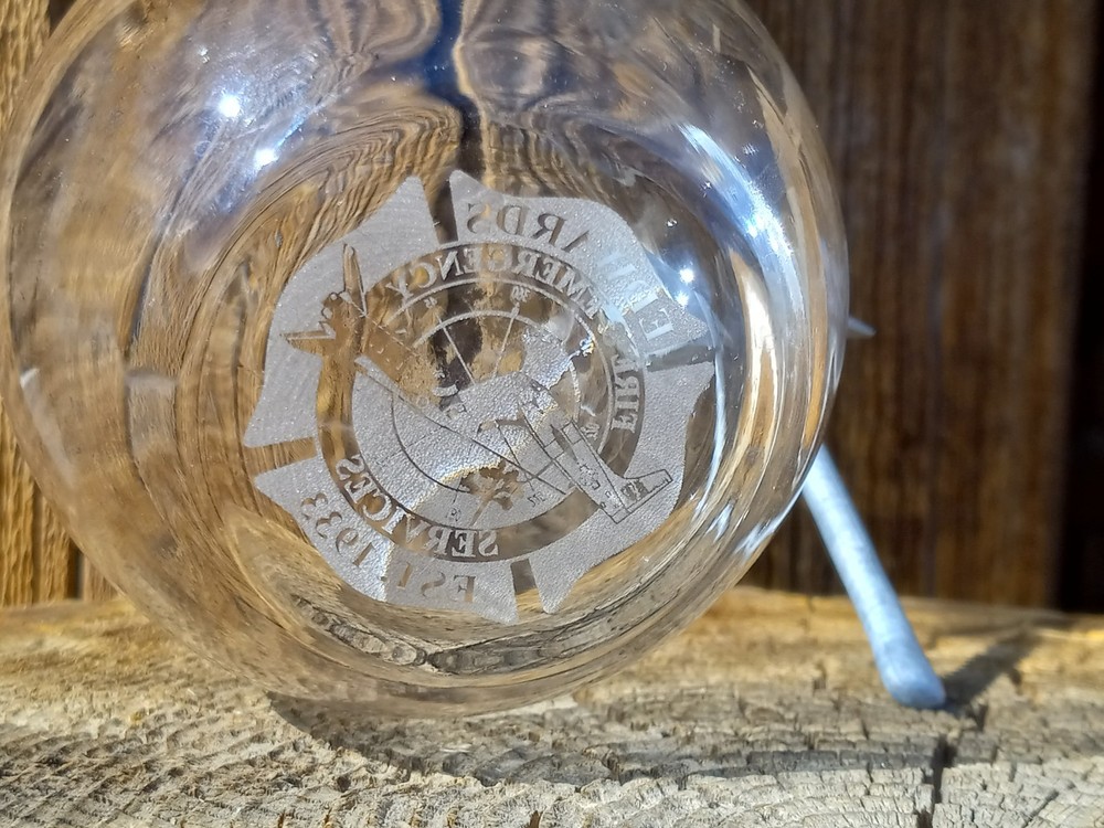 Edwards AFB Fire & Emergency Services glass w/axe embedded