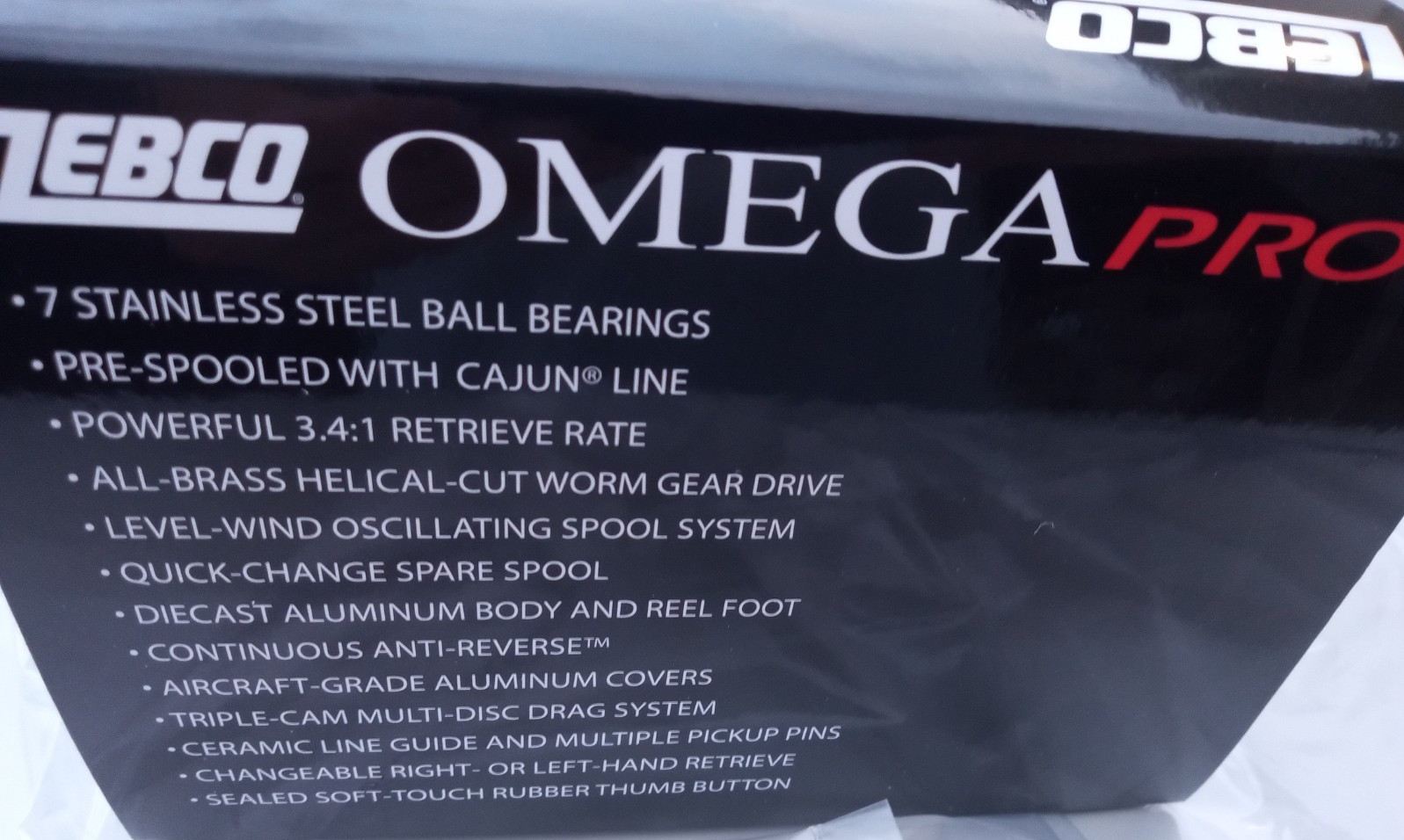 new in box ZEBCO OMEGA PRO 3 Z03PRO 3.4:1 W/10LB LINE 7 BEARING SPINCAST REEL