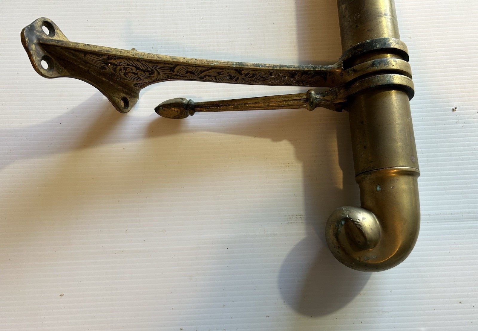ANTIQUE BRASS BAR END RAIL AND FANCY DECORATED RAIL HANGERS