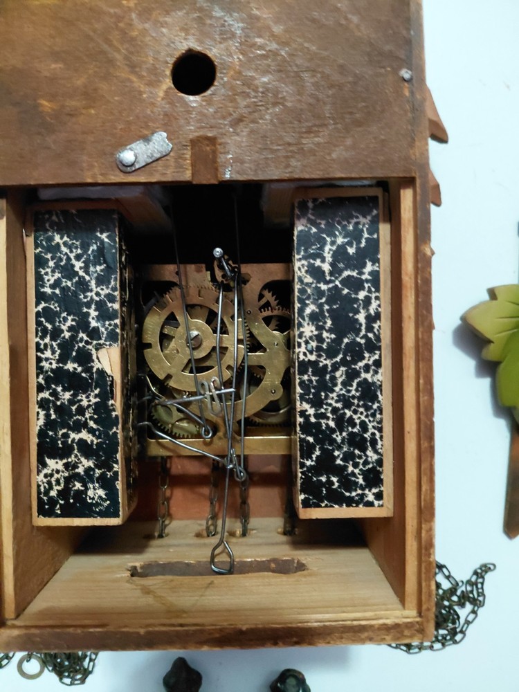 Vintage deeply hand carved Cuckoo clock