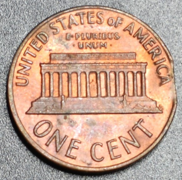 1971 ERROR PENNY CLIPPED EDGE 49