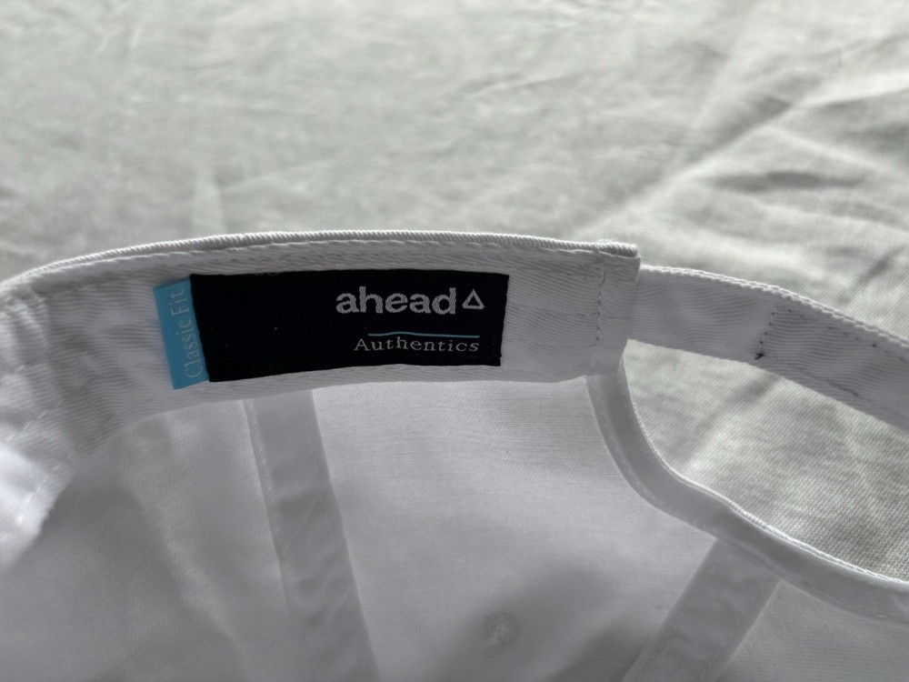 NWT Lost Pines Golf Course Hat Adjustable ‘Howdy Script’ Pink on White