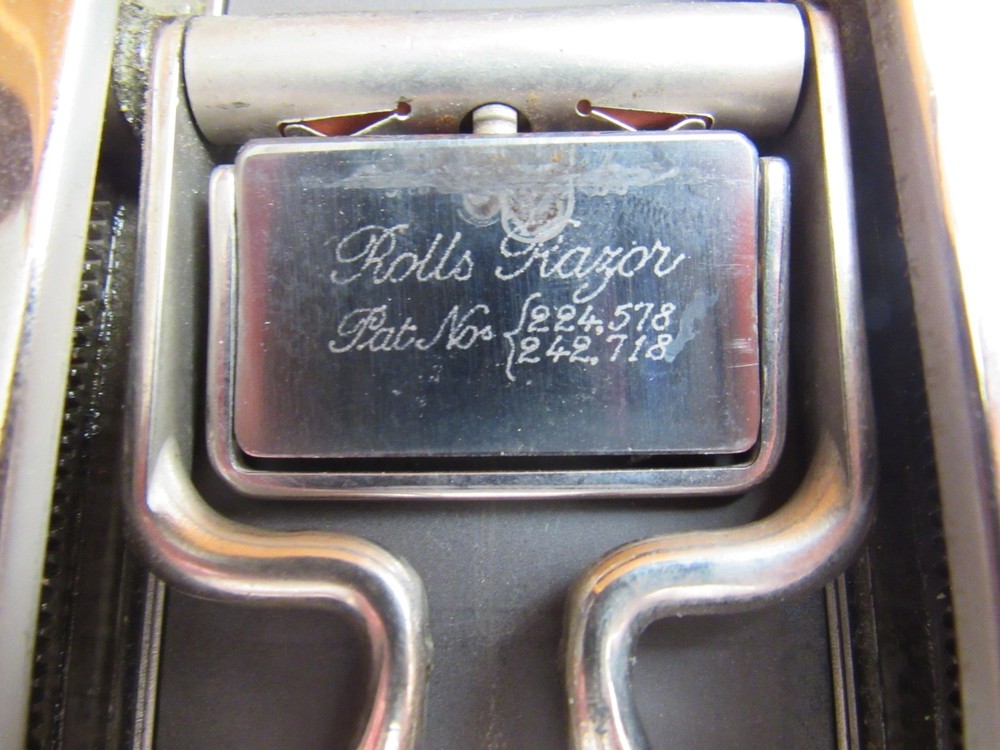 Antique Rolls Razor
