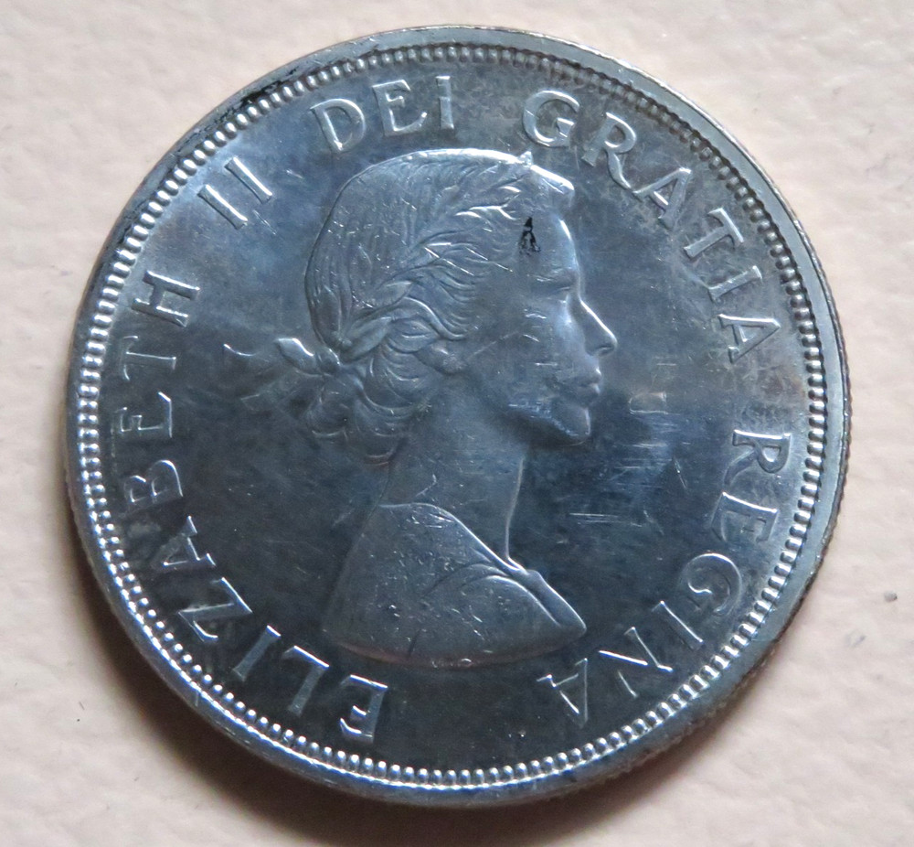Canada. 1964 Silver - 1 Dollar.. Quebec.. UNC - Full Lustre