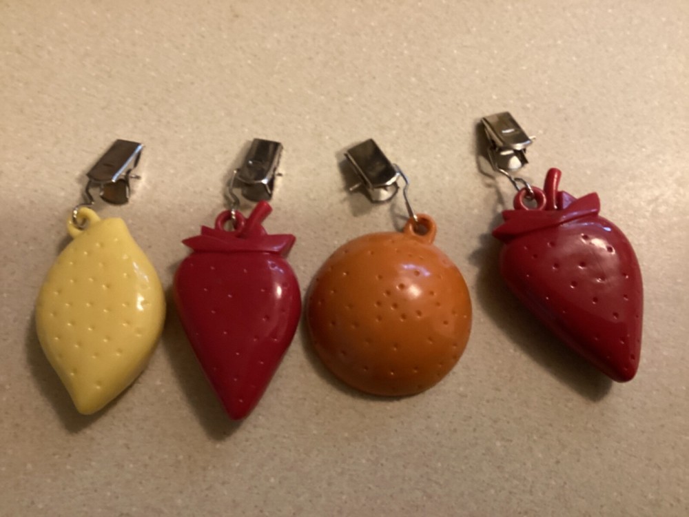 Whimsical vintage tablecloth weights; 2 designs; 4 each