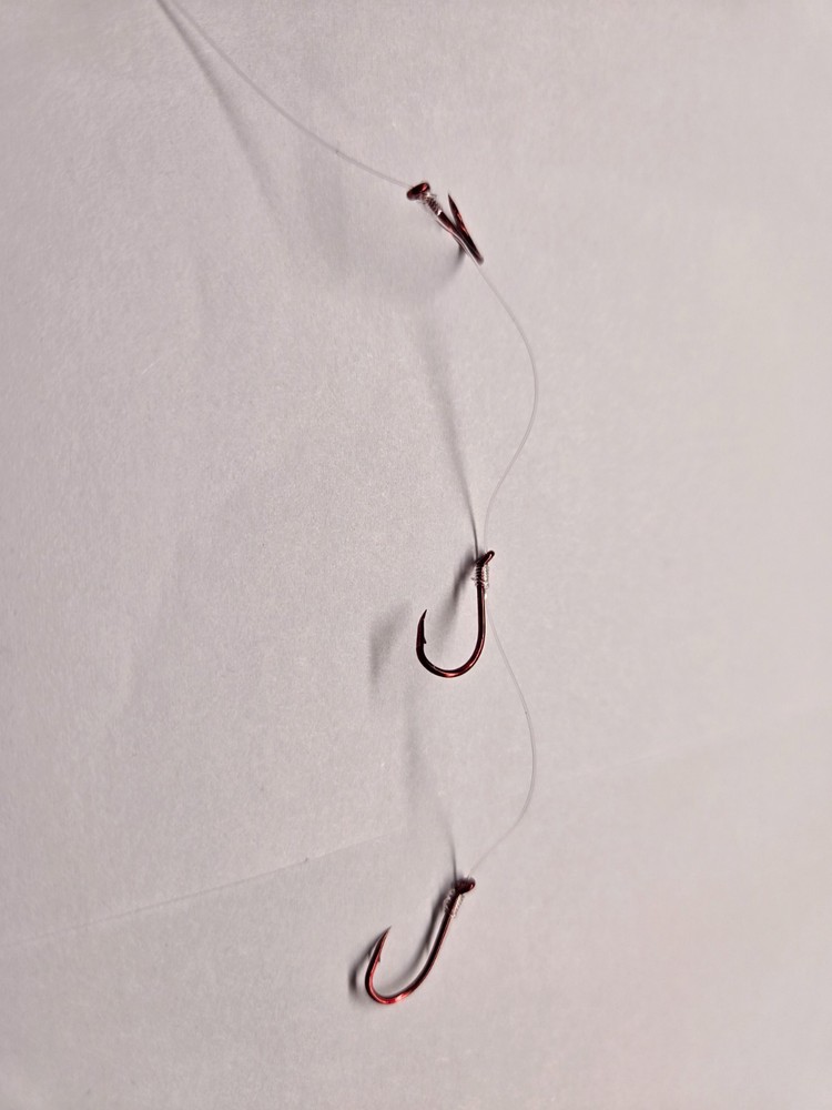 12worm harnesses with triple #2 red octopus red hooks.