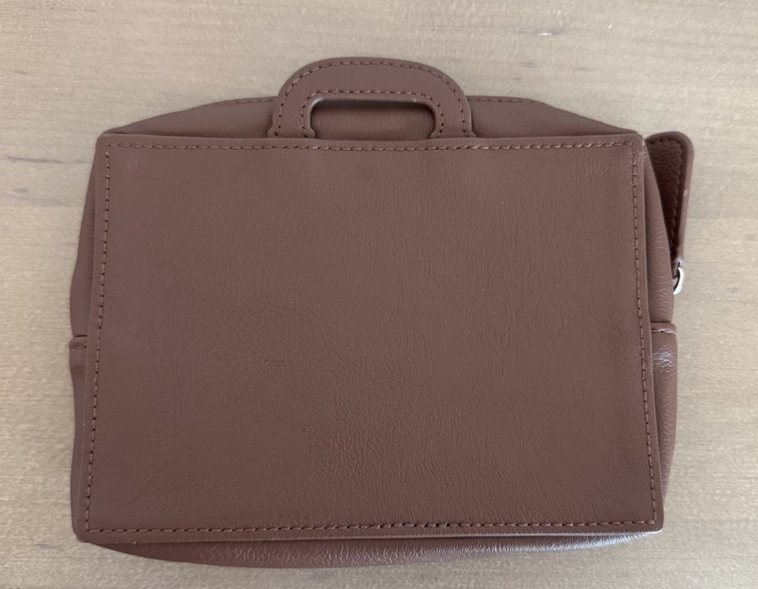 Disney Parks “ It’s A Small World” Traveler Clutch