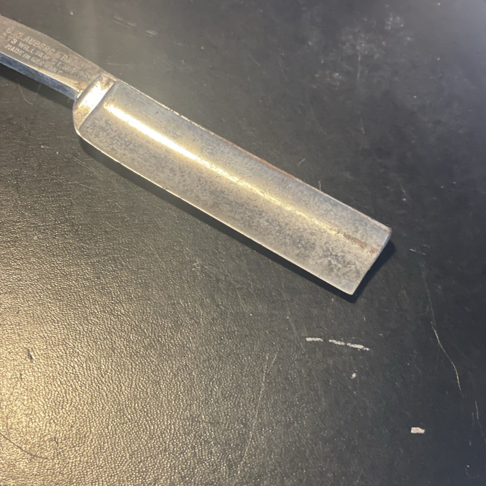 Two vintage straight razors