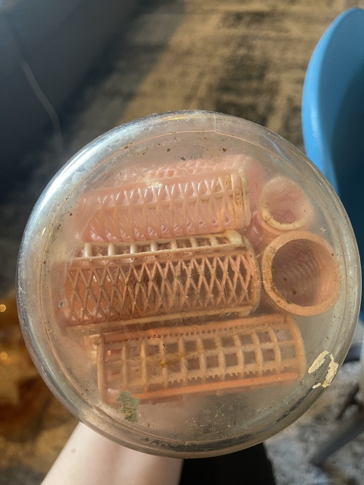 Antique Hair Rollers In Jar