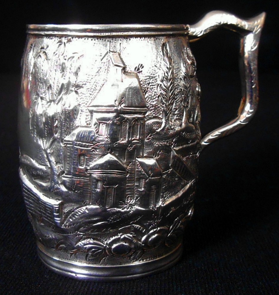 A solid silver child's mug, architectural repousse, S. Kirk & Son, 11 oz, c.1860