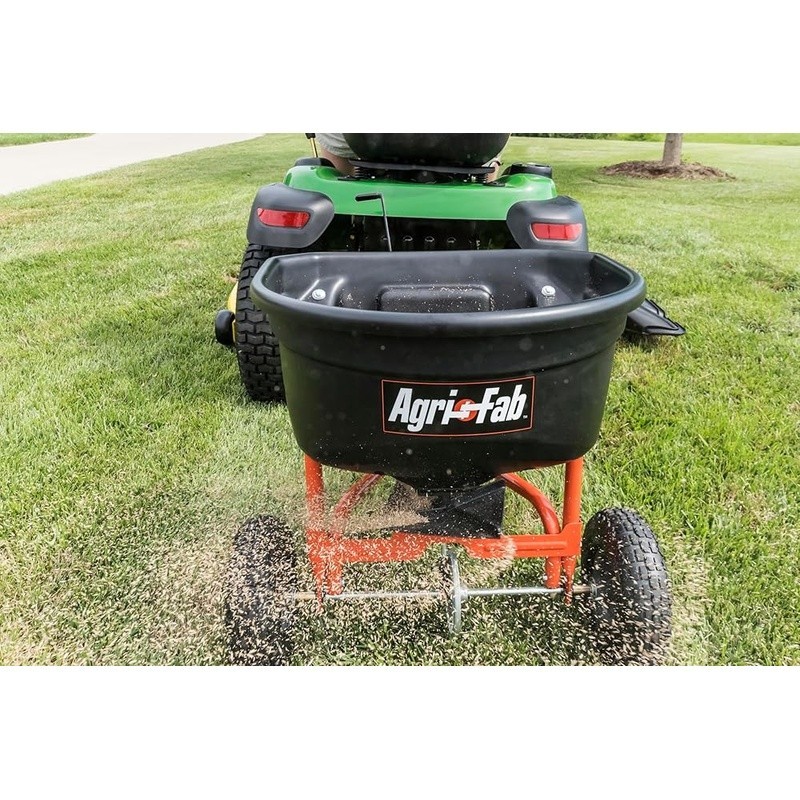 110lb Tow Broadcast Spreader Rustproof Hopper Pneumatic Tires 10ft Spread Width