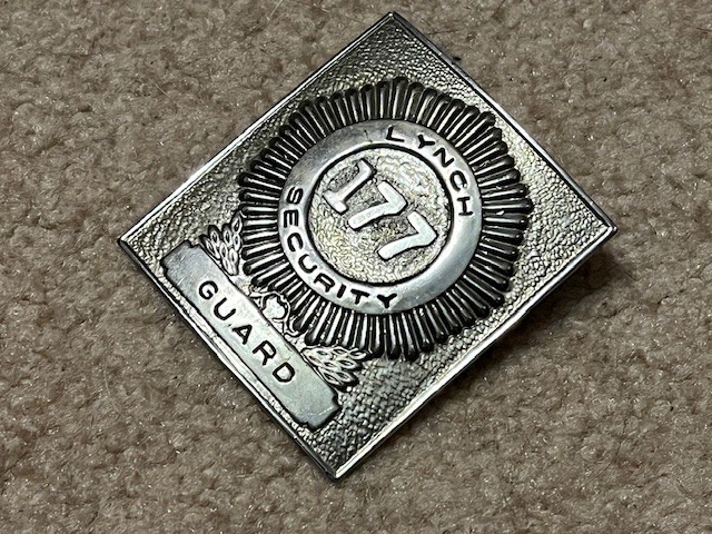 Vintage Obsolete Lynch Security Guard square badge.